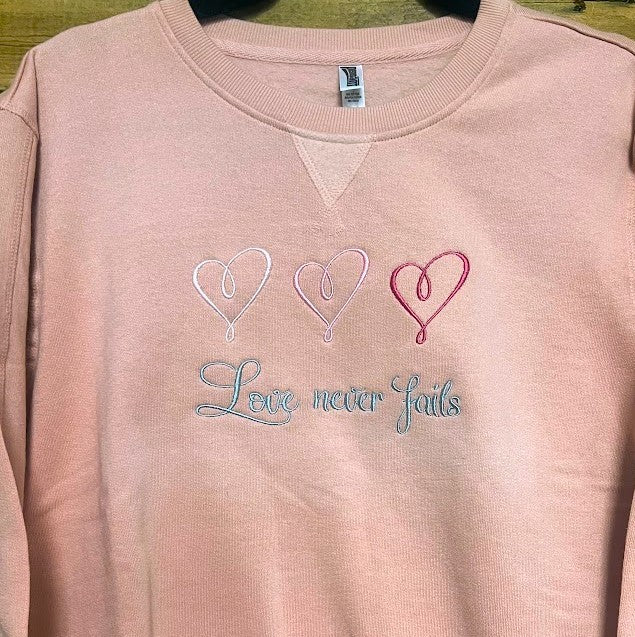Love Never Fails Crewneck|8616