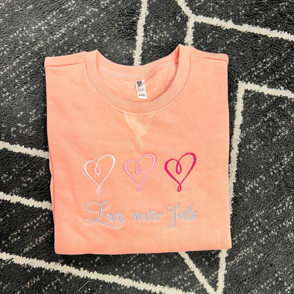 Love Never Fails Crewneck|8615